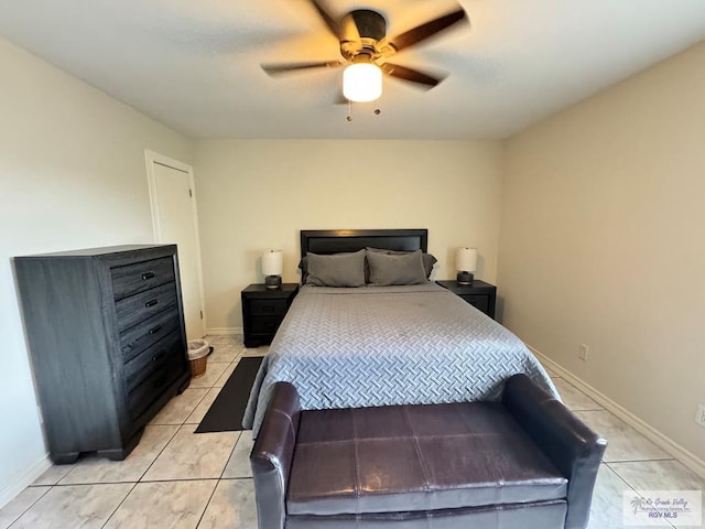 bedroom featuring ceiling fan and light tile patterned flooring