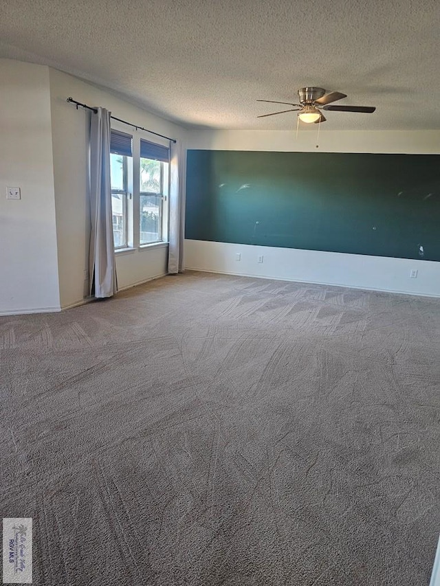 1149 Champlain Dr, Brownsville, TX 78526 - carpeted empty room with a textured ceiling and ceiling fan