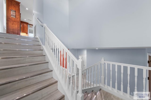 1013 Tarpon Ave, Port Isabel, TX 78578 - stairs with wood finished floors and recessed lighting