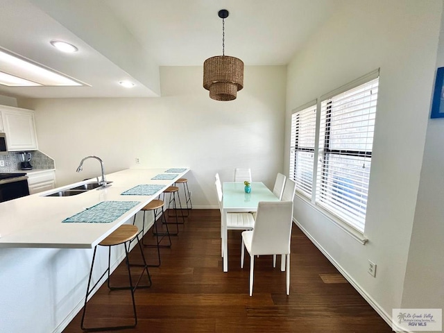 77 Santa Isabel Blvd Unit K 6, Laguna Vista, TX 78578 - dining space featuring dark wood-type flooring and recessed lighting