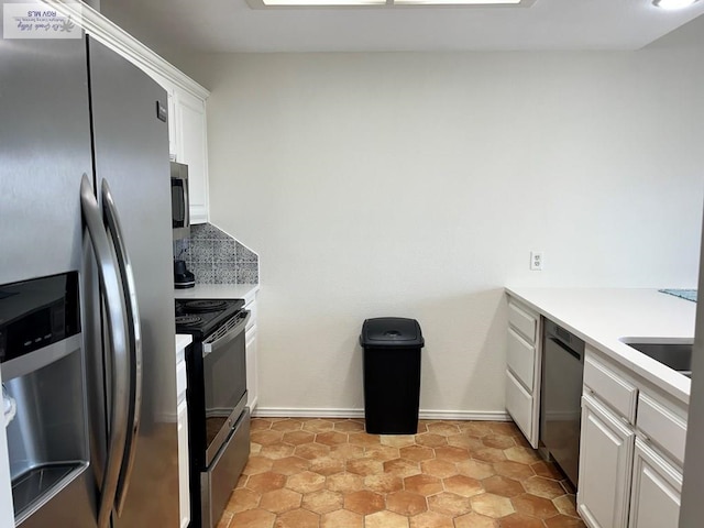 77 Santa Isabel Blvd Unit K 6, Laguna Vista, TX 78578 - kitchen featuring stainless steel appliances, white cabinets, and light countertops