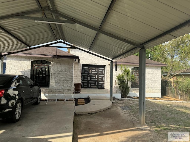 exterior space featuring a carport