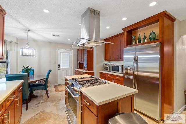 kitchen featuring a center island, stainless steel appliances, a chandelier, pendant lighting, and island range hood