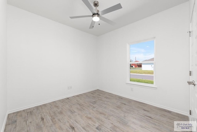 unfurnished room featuring ceiling fan and light hardwood / wood-style flooring