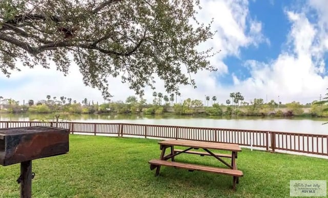 view of yard with a water view