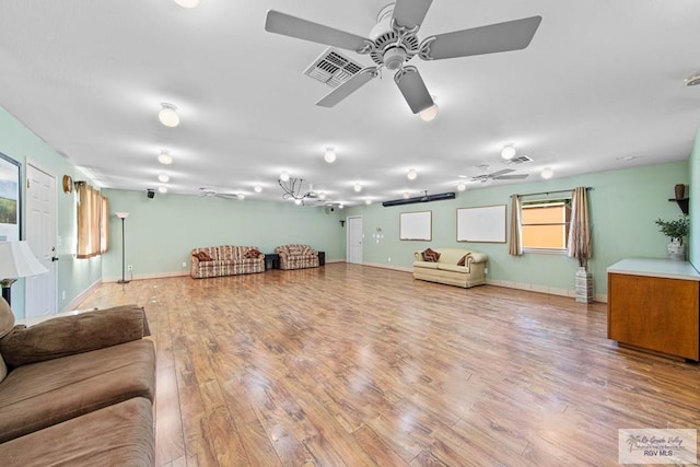 living room with wood-type flooring