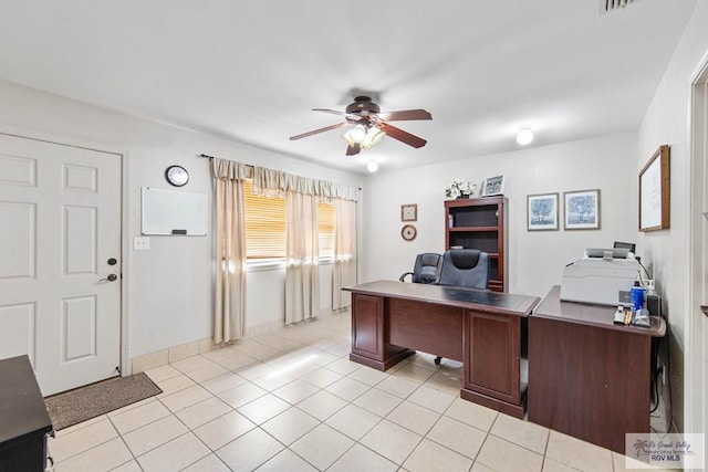 office area with ceiling fan and light tile patterned floors