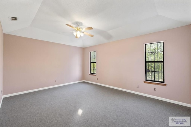 3401 Del Mar Dr, Mission, TX 78574 - spare room featuring a wealth of natural light, baseboards, a ceiling fan, and visible vents