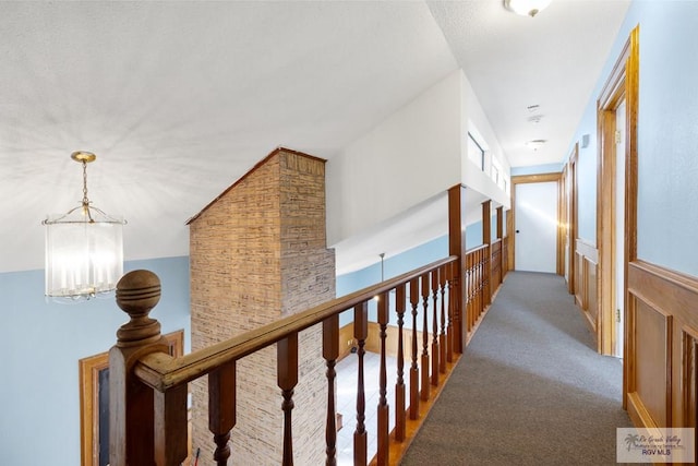 3401 Del Mar Dr, Mission, TX 78574 - corridor with a chandelier and carpet floors