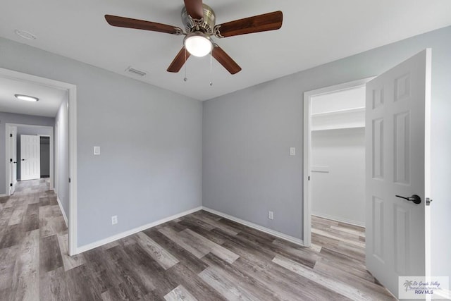 spare room featuring hardwood / wood-style flooring