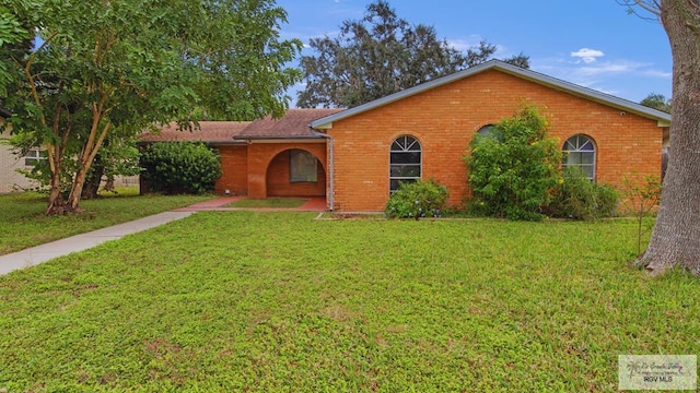 1722 High St, Harlingen, TX 78550 - single story home featuring a front lawn and brick siding