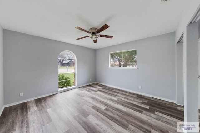 unfurnished bedroom with wood-type flooring and ceiling fan