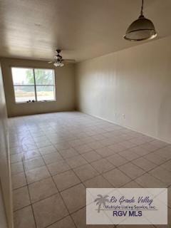 unfurnished room featuring ceiling fan