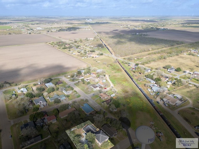 birds eye view of property featuring a rural view