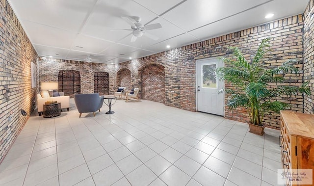 view of patio with an outdoor living space and ceiling fan