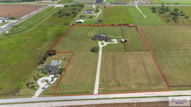 birds eye view of property featuring a rural view