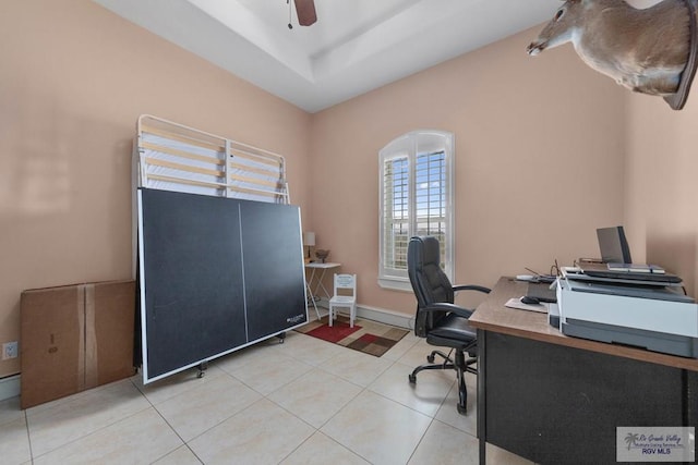 office space featuring tile patterned floors and ceiling fan