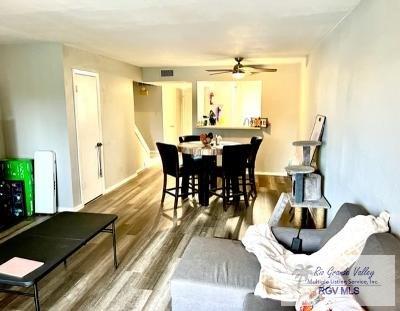 1900 E Elizabeth St Unit F13, Brownsville, TX 78520 - dining area with ceiling fan and wood finished floors