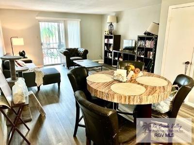 1900 E Elizabeth St Unit F13, Brownsville, TX 78520 - dining space featuring wood finished floors