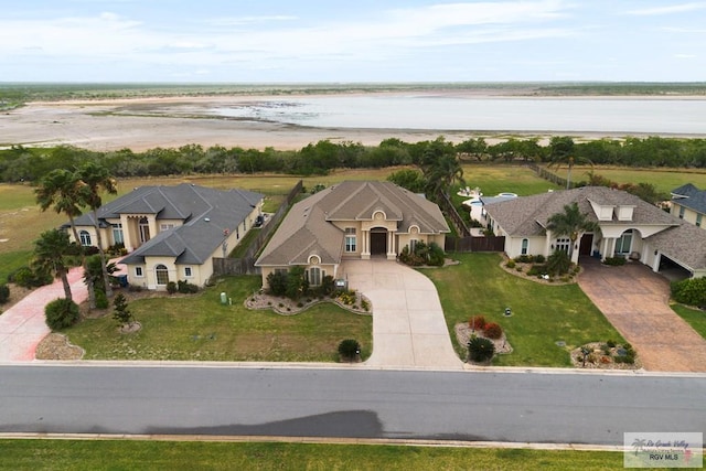 bird's eye view with a water view