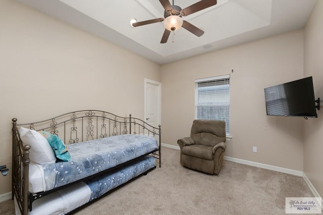 bedroom with light carpet and ceiling fan