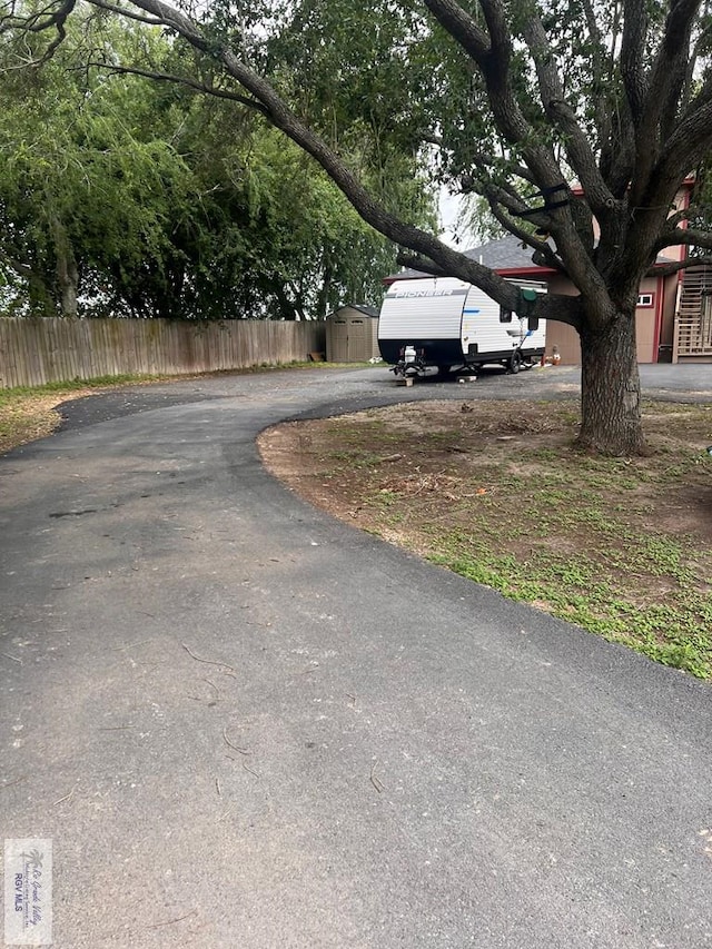 view of street featuring driveway