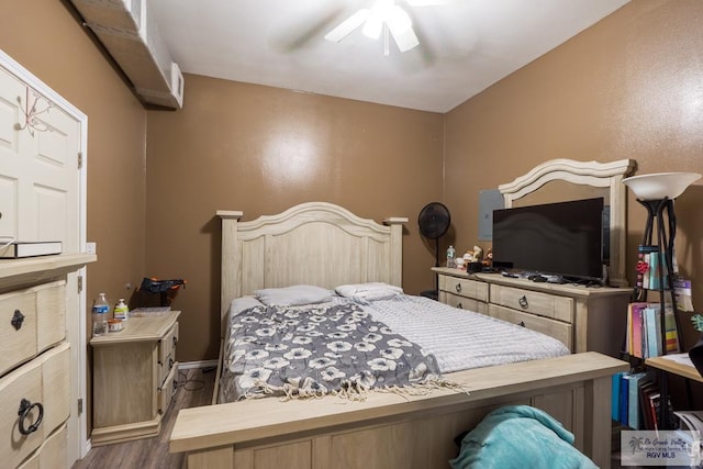 bedroom with wood finished floors and ceiling fan