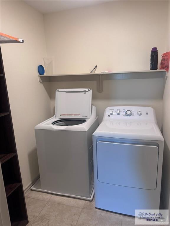 5200 Umar Ave, Mission, TX 78573 - laundry room with separate washer and dryer and laundry area