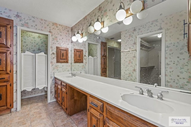full bath featuring a closet and a sink