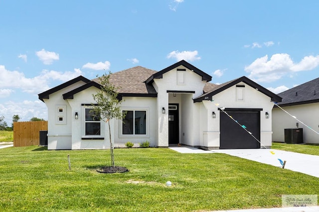 324 N Leon Ave, Elsa, TX 78543 - modern farmhouse with stucco siding, driveway, an attached garage, roof with shingles, and central air condition unit
