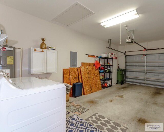 garage featuring washer / dryer, electric water heater, electric panel, and a garage door opener