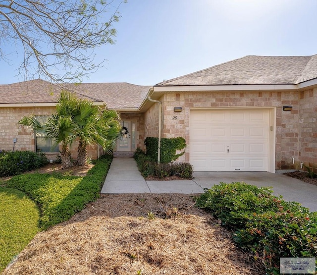 ranch-style house with a garage