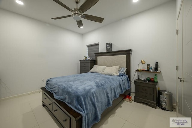 bedroom featuring ceiling fan and light tile patterned flooring