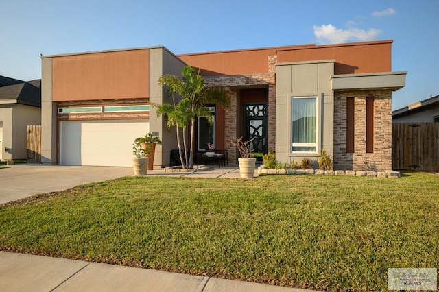 contemporary home with a garage and a front lawn