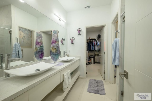 bathroom with vanity and tile patterned floors