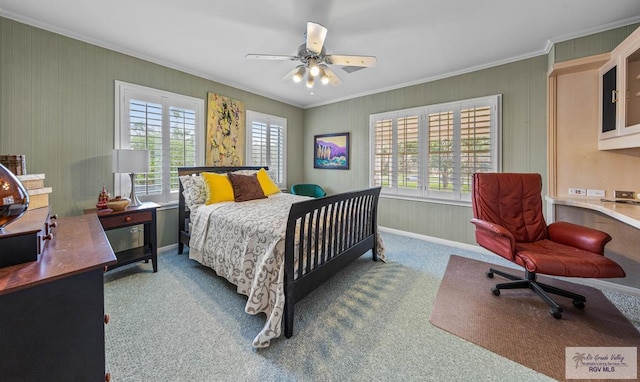 2301 Riverside Dr, Harlingen, TX 78550 - carpeted bedroom featuring baseboards, ornamental molding, and a ceiling fan