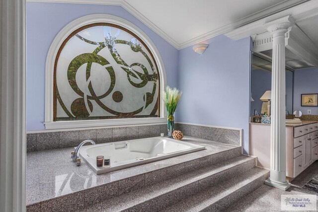2301 Riverside Dr, Harlingen, TX 78550 - full bath featuring decorative columns, a tub with jets, crown molding, and vanity