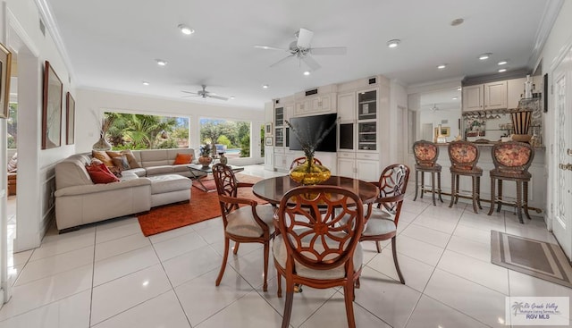 2301 Riverside Dr, Harlingen, TX 78550 - dining room featuring light tile patterned floors, recessed lighting, a ceiling fan, and crown molding