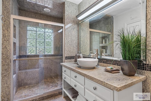 2301 Riverside Dr, Harlingen, TX 78550 - bathroom with a shower stall, crown molding, and vanity