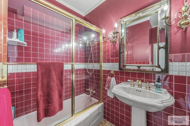 2301 Riverside Dr, Harlingen, TX 78550 - full bath with ornamental molding, shower / bath combination with glass door, and tile walls