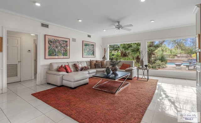 2301 Riverside Dr, Harlingen, TX 78550 - living room with plenty of natural light, visible vents, crown molding, and light tile patterned flooring