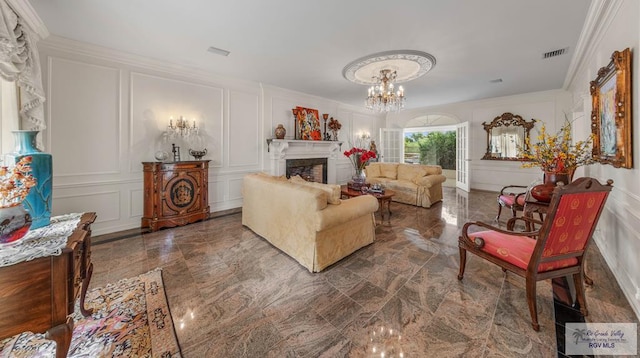 2301 Riverside Dr, Harlingen, TX 78550 - living area with crown molding, a fireplace, and a decorative wall