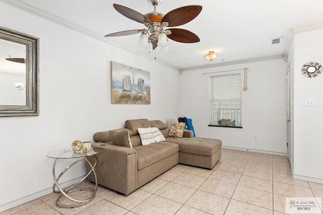 tiled living room with ceiling fan and ornamental molding