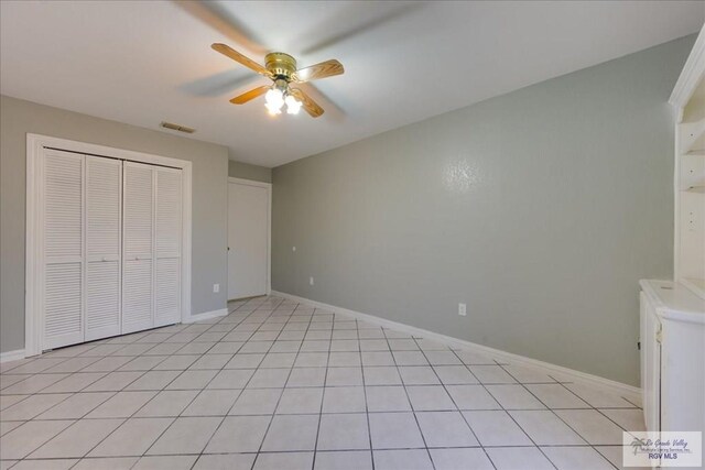 1544 W San Marcelo Blvd, Brownsville, TX 78526 - unfurnished bedroom featuring a ceiling fan, baseboards, visible vents, and a closet
