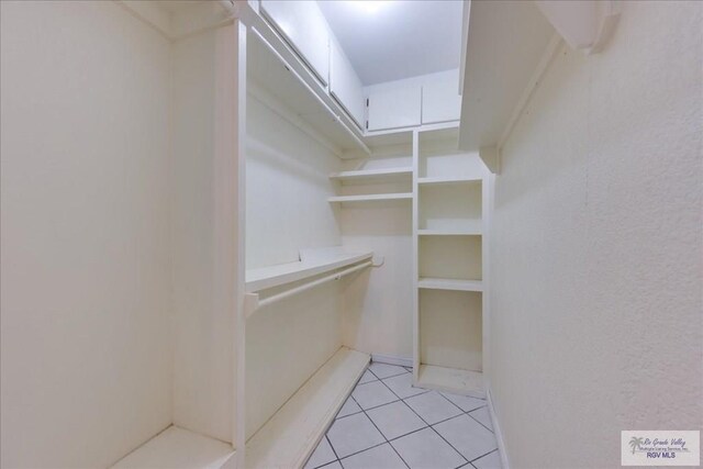1544 W San Marcelo Blvd, Brownsville, TX 78526 - walk in closet with light tile patterned floors