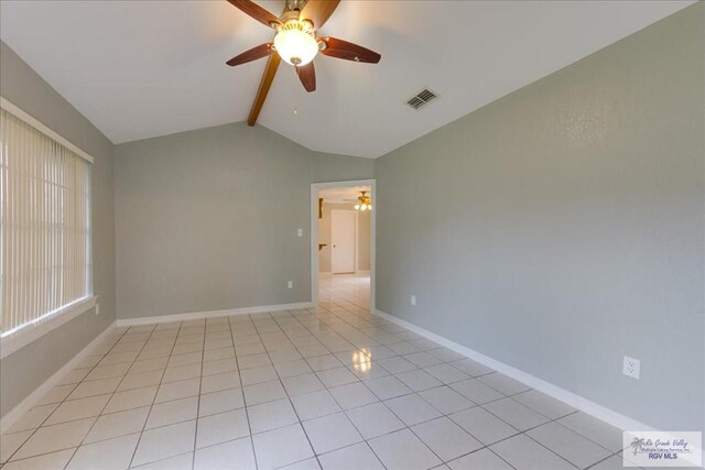 1544 W San Marcelo Blvd, Brownsville, TX 78526 - empty room featuring ceiling fan, visible vents, light tile patterned floors, baseboards, and lofted ceiling with beams