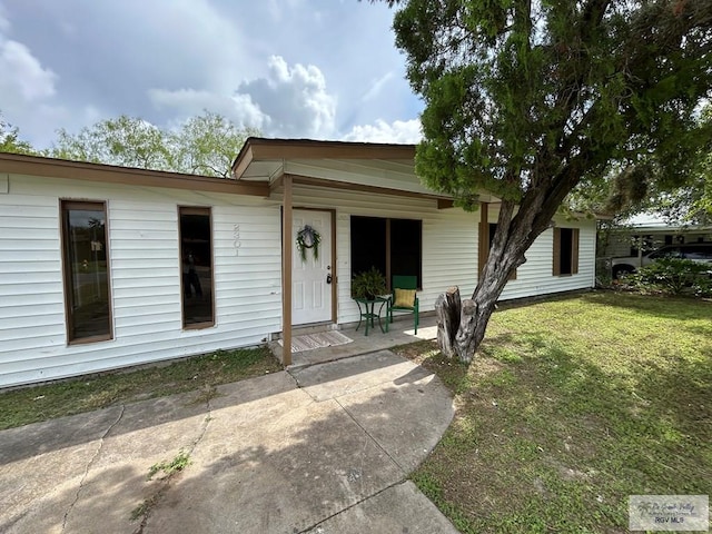 2301 E Monroe St, Harlingen, TX 78550 - view of front of home featuring a front yard