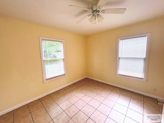 2301 E Monroe St, Harlingen, TX 78550 - spare room featuring a ceiling fan and light tile patterned floors