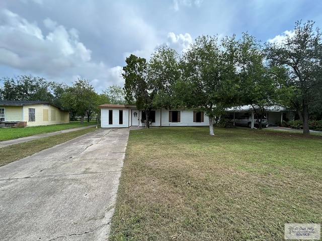 2301 E Monroe St, Harlingen, TX 78550 - ranch-style house featuring driveway and a front lawn