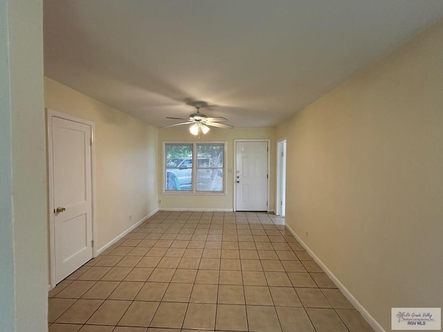 2301 E Monroe St, Harlingen, TX 78550 - empty room featuring a ceiling fan and light tile patterned flooring